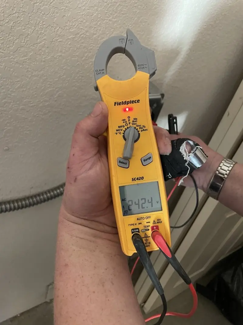 Voltage testing with clamp meter during Generator Installation in Kalamazoo
